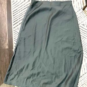 Worn once, flattering silk skirt.